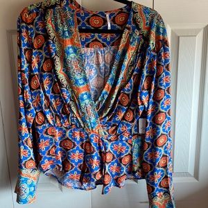 NWT Free People Falling For You Floral Print Long Sleeve Peplum Top Size Medium